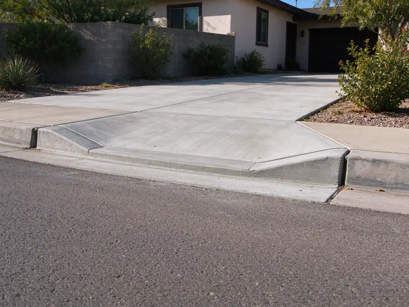 Wood forms for a depressed curb, wings and apron at a Mesa curb cut